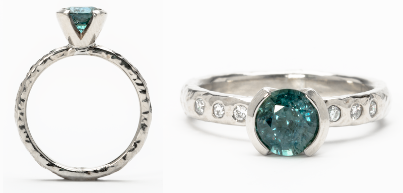 A Teal Montana Sapphire Engagement Ring in 14K white gold.